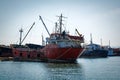 Old, rusty, cargo vessels at a ship-breaker.