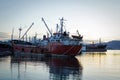 Old, rusty, cargo vessels at a ship-breaker