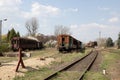 Old rusty cars standing in the abandoned depot Royalty Free Stock Photo