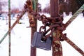 Old rusty castle on the rusty gate to the cemetery, closed old cemetery Royalty Free Stock Photo