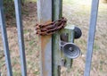 old rusty chain on a metal gate Royalty Free Stock Photo