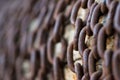 Old rusty chain in row close up shot Royalty Free Stock Photo