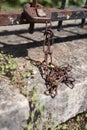 Old rusty chain on a wooden fence Royalty Free Stock Photo