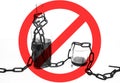 Old rusty chains around the bottle and glass. Addicted to alcohol. Dangerous habit. Stop sign Royalty Free Stock Photo