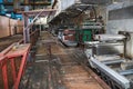 Old rusty closed peeling shop at a abandoned industrial obsolete chemical petrochemical engineering refinery with metal iron pipes