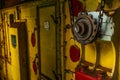 Old rusty cogwheel and chain on a yellow dryer machinery used in