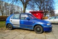 Old blue rusty scrap car Skoda Felicia parked