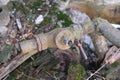 old rusty crooked water pipe with faucet