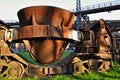 Old rusty cup for casting steel on a rail vehicle