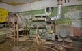 An old, rusty diesel generator