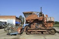 Old rusty disassembled combine harvester.