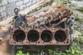 Old rusty disassembled eight-cylinder engine