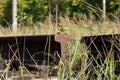 Old rusty disassembled railway rails.