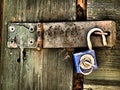 An old rusty door lock, intriguing with a combination of colors along with rust,backgrounds,abstract Royalty Free Stock Photo