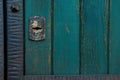 Old rusty and dusty keyhole wallpaper. Vintage keyhole on old wooden door background. Keyhole of old door. Royalty Free Stock Photo