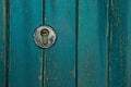 Old rusty and dusty keyhole wallpaper. Vintage keyhole on old wooden door background. Keyhole of old door. Royalty Free Stock Photo