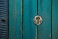Old rusty and dusty keyhole wallpaper. Vintage keyhole on old wooden door background. Keyhole of old door. Royalty Free Stock Photo