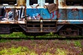 Old rusty electric train abandoned on unused siding