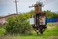 Old rusty electrical control unit outside in coutryside Royalty Free Stock Photo