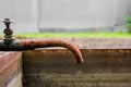 Old rusty faucet in the garden