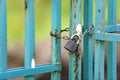 Old rusty fence or gate with chained padlock Royalty Free Stock Photo