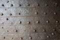 Old rusty forged metal with rivets texture Royalty Free Stock Photo