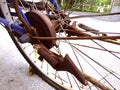 Rusty frame chain and gear on blue bicycle Royalty Free Stock Photo