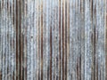 Old rusty galvanized, corrugated iron siding texture background.A rusty corrugated iron metal texture background. Old rusty zinc p