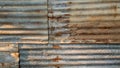 The tin roof background with the rust and nails hole by vintage style Royalty Free Stock Photo