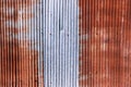 old rusty galvanized. wheathered rust and scratched steel texture corrugated iron siding vintage background.