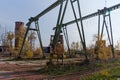 Old rusty gantry bridge crane in abandoned industrial area Royalty Free Stock Photo