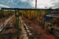 Old rusty gantry bridge crane in abandoned industrial area Royalty Free Stock Photo