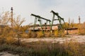 Old rusty gantry bridge crane in abandoned industrial area Royalty Free Stock Photo