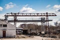 Old rusty gantry crane at abandoned construction site. Royalty Free Stock Photo