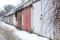 Old rusty garages in the CIS countries in the winter