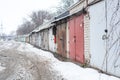 Old rusty garages in the CIS countries in the winter