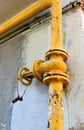 An old rusty gas control valve on the wall Royalty Free Stock Photo