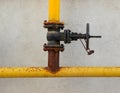 An old rusty gas control valve on the wall Royalty Free Stock Photo