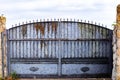 Old rusty gate in an abandoned house Royalty Free Stock Photo