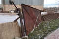 Old rusty gate rooted to the ground Royalty Free Stock Photo