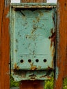 Old rusty green mailbox. Royalty Free Stock Photo