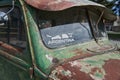 Old rusty green old timer pick up truck with split window and sticker of the route 40 Royalty Free Stock Photo