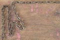 Old rusty grunge chain on vinatge grunge wooden background Royalty Free Stock Photo