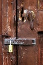 Old Rusty Handle on Door with Lock Royalty Free Stock Photo