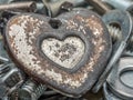 Old rusty heart-shaped pendant