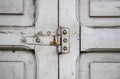 Old rusty hinge on a wooden window Royalty Free Stock Photo