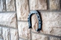 Old rusty horseshoe on a stone background Royalty Free Stock Photo