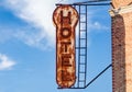 Old Rusty Hotel Sign on Building in NYC Royalty Free Stock Photo