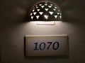 House number.Number plate on the wall. Royalty Free Stock Photo