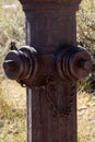 Old rusty hydrant in the USA. Fire equipment. Royalty Free Stock Photo